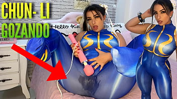 Super-sexy costume play lady clothed as Chun Li from street fighter toying with her htachi electro-hitachi nutting and soaking her undies and trousers ahegao